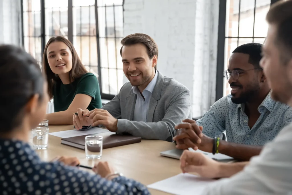 people sitting round a table having a discussion